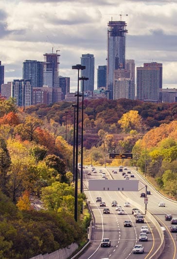 Road to city skyscrapers